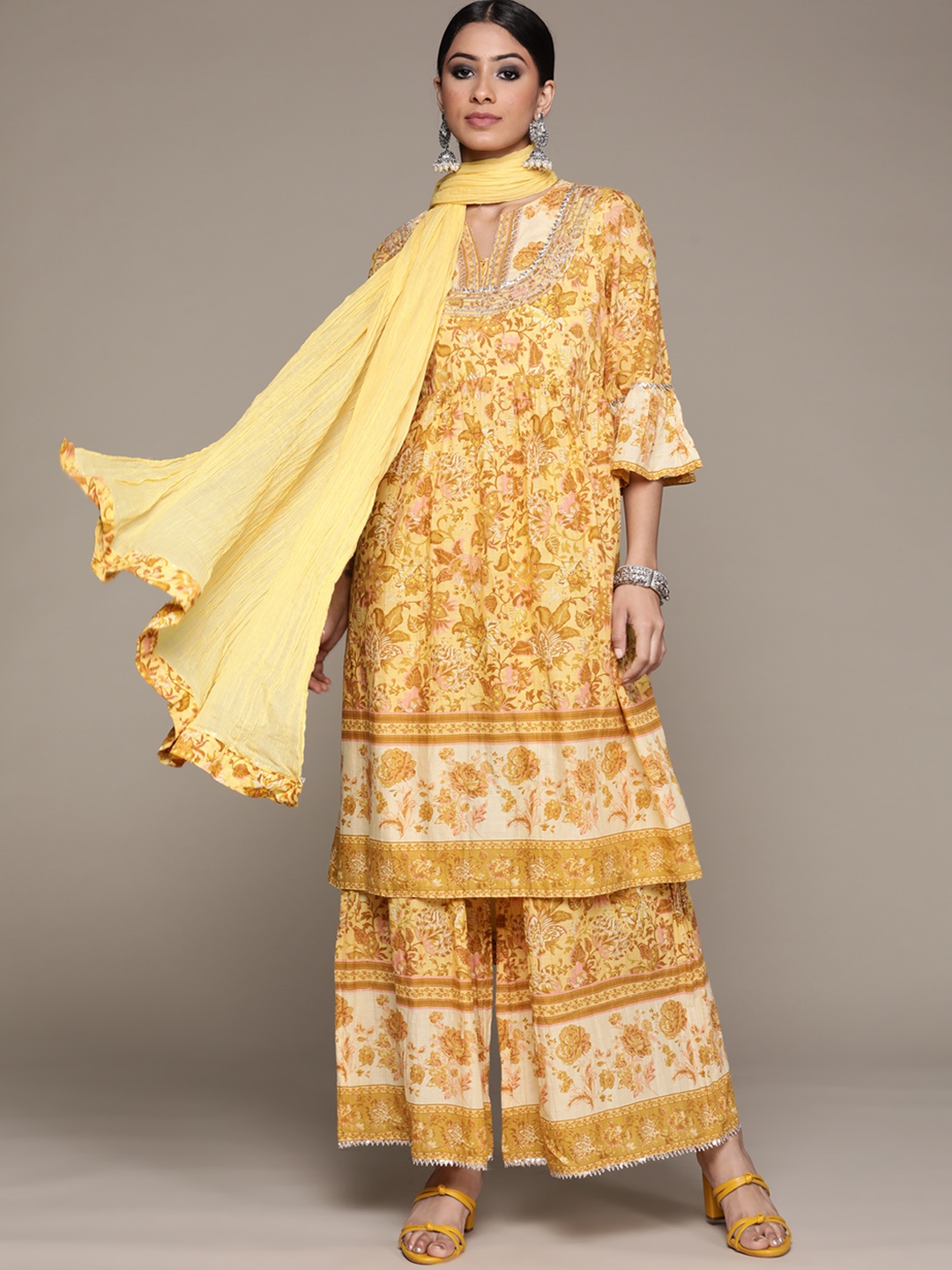 aarke Ritu Kumar Women Yellow & Off-White Cotton Floral Print Kurta with Sharara & Dupatta
aarke Ritu Kumar Women Yellow & Off-White Cotton Floral Print Kurta with Sharara & Dupatta