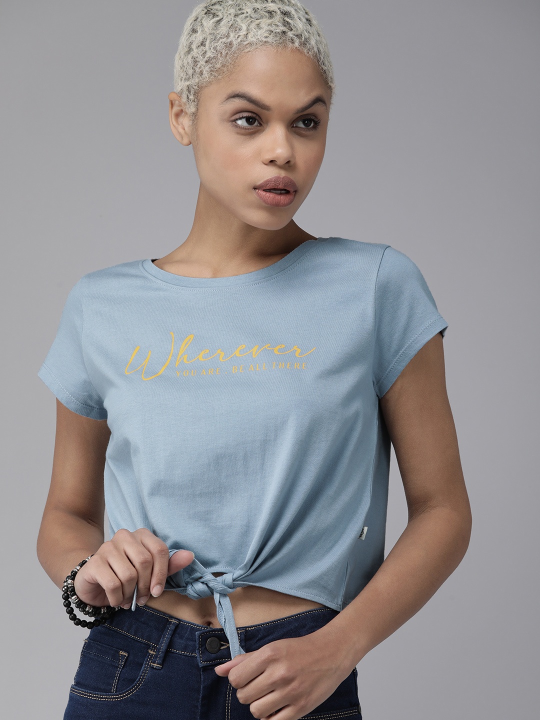 The Roadster Lifestyle Co Women Blue & Yellow Typography Printed Waist Tie Up Pure Cotton T-shirt With
The Roadster Lifestyle Co Women Blue & Yellow Typography Printed Waist Tie Up Pure Cotton T-shirt With