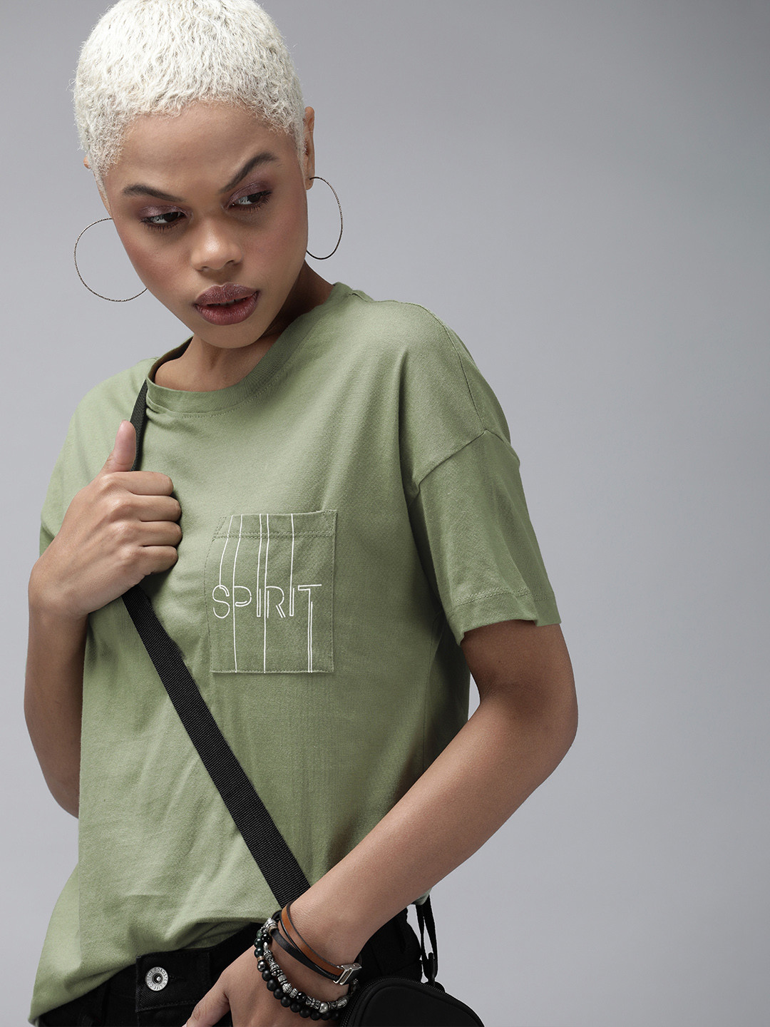 The Roadster Lifestyle Co Women Green & White Printed Drop-Shoulder Sleeves Pure Cotton Boyfriend T-shirt 
The Roadster Lifestyle Co Women Green & White Printed Drop-Shoulder Sleeves Pure Cotton Boyfriend T-shirt