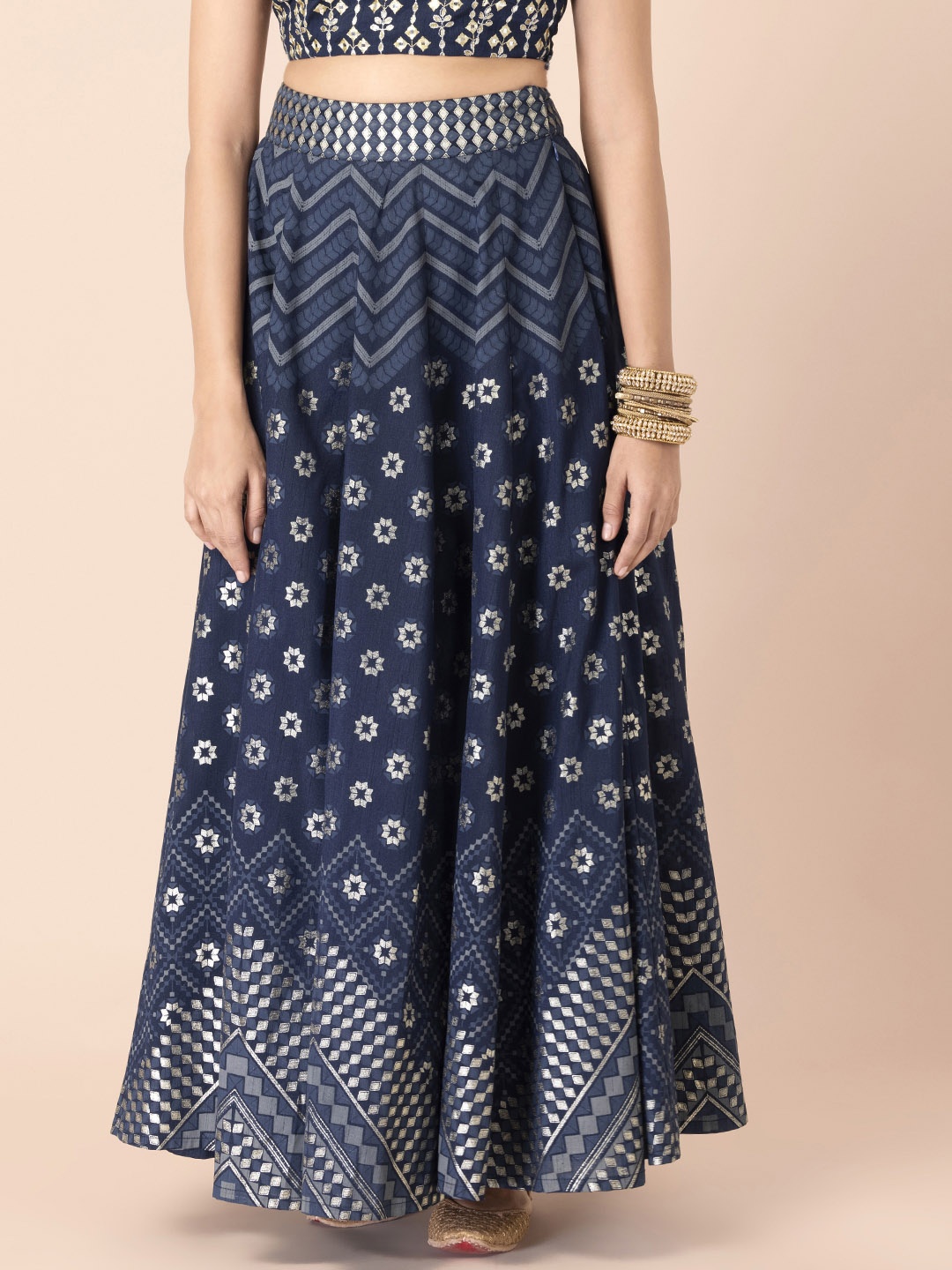 INDYA Shraddha Kapoor Women Blue & Silver-Coloured Chevron Foil Printed Flared Maxi Skirt
INDYA Shraddha Kapoor Women Blue & Silver-Coloured Chevron Foil Printed Flared Maxi Skirt