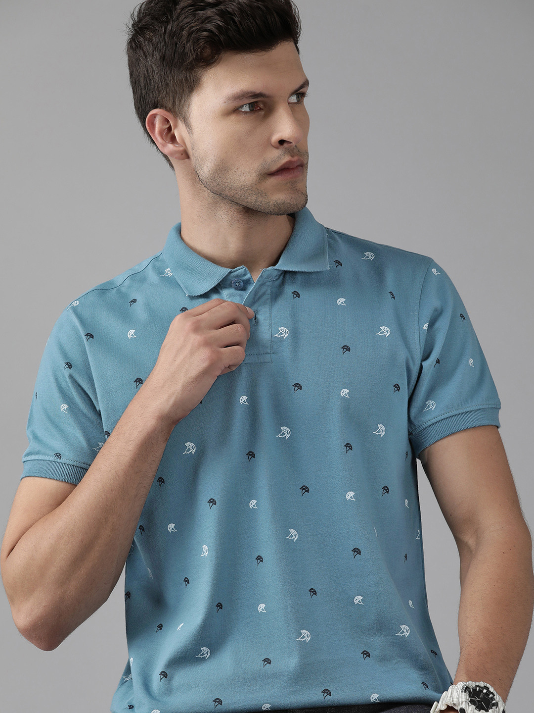 Roadster Men Blue & White Nautical Printed Polo Collar Pure Cotton T-shirt 
Roadster Men Blue & White Nautical Printed Polo Collar Pure Cotton T-shirt