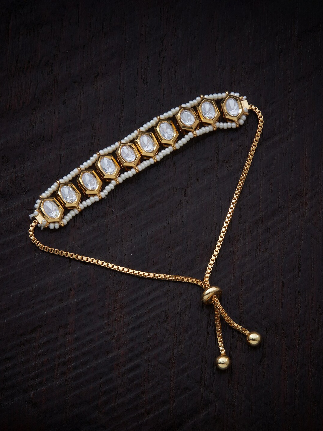Kushal's Fashion Jewellery Women Kundan Pearl Finishing Gold-Plated Wraparound Bracelet
Kushal's Fashion Jewellery Women Kundan Pearl Finishing Gold-Plated Wraparound Bracelet