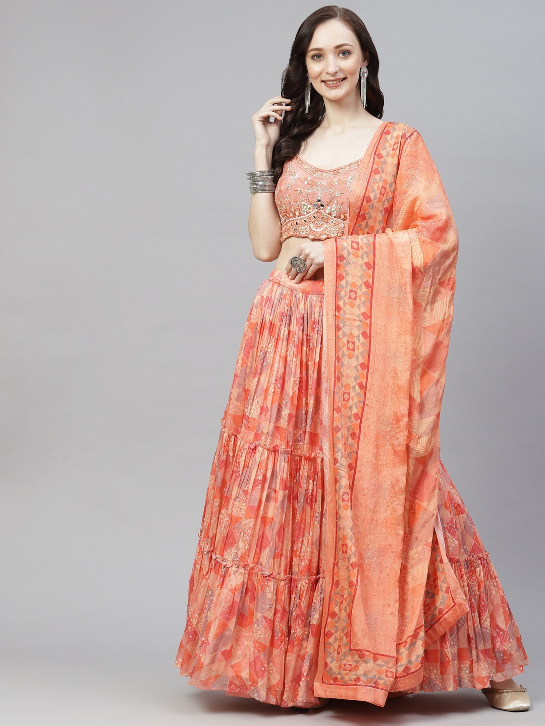 Readiprint Fashions Orange & Beige Embroidered Mirror Work Unstitched Lehenga & Blouse With Dupatta
Readiprint Fashions Orange & Beige Embroidered Mirror Work Unstitched Lehenga & Blouse With Dupatta