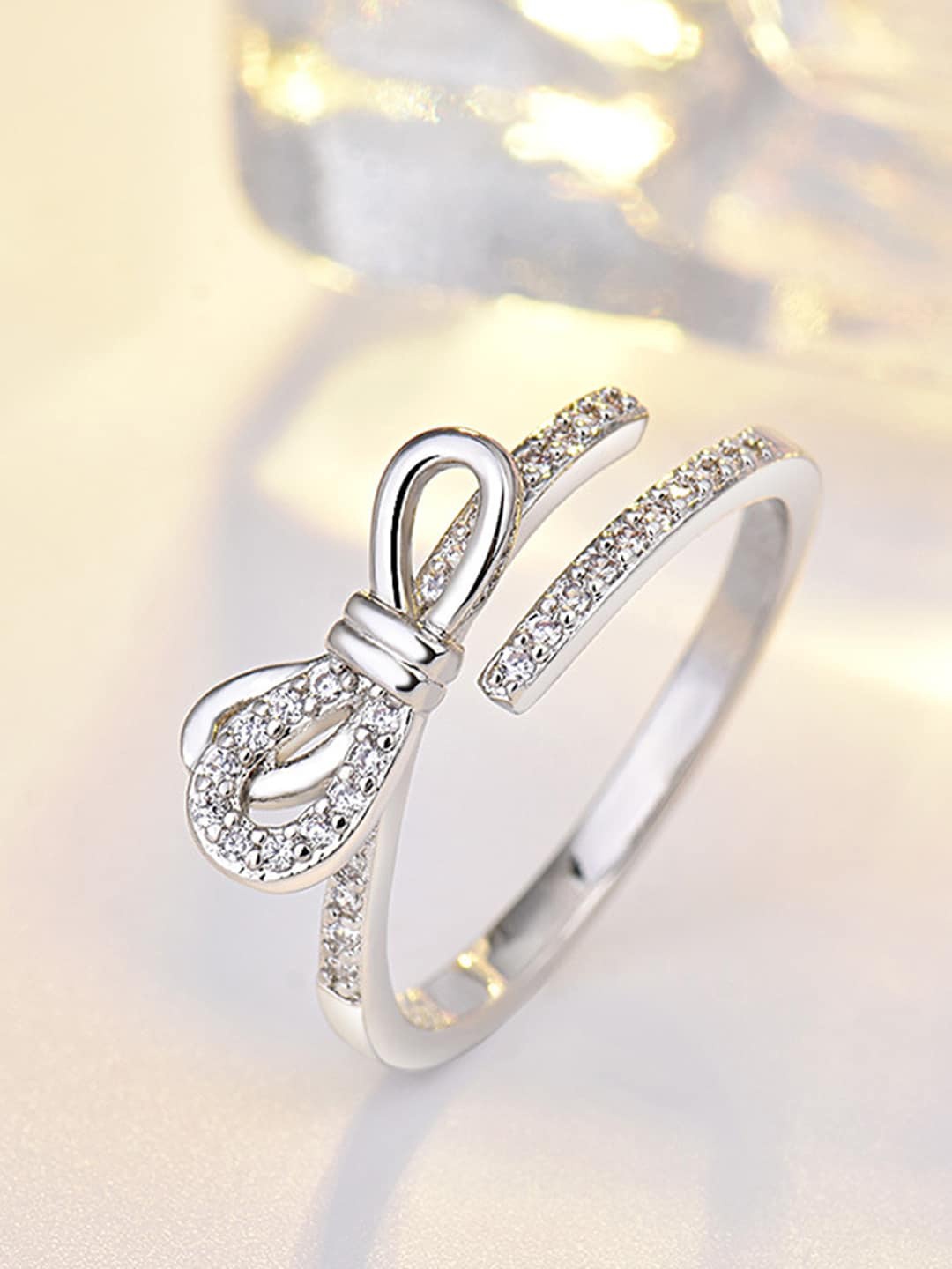 Shining Diva Fashion Platinum-Plated Silver-Toned White Solitaire-Studded Adjustable Finger Ring
Shining Diva Fashion Platinum-Plated Silver-Toned White Solitaire-Studded Adjustable Finger Ring