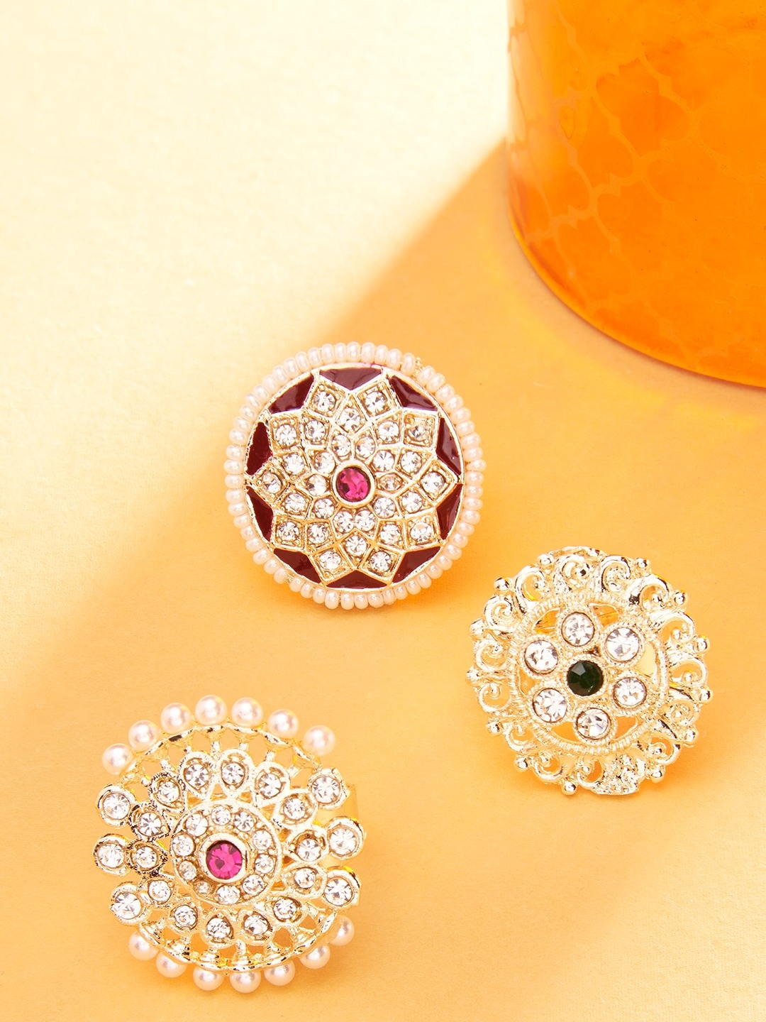Zaveri Pearls Set Of 3 Gold-Plated White Stone-Studded & Pearl Beaded Adjustable Finger Rings
Zaveri Pearls Set Of 3 Gold-Plated White Stone-Studded & Pearl Beaded Adjustable Finger Rings
