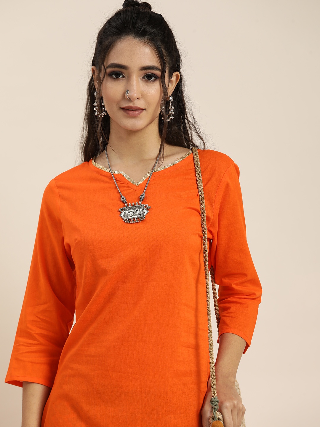 Sangria Women Orange & Green Pure Cotton Solid Mirror Work Kurta with Bandhani Trousers
Sangria Women Orange & Green Pure Cotton Solid Mirror Work Kurta with Bandhani Trousers