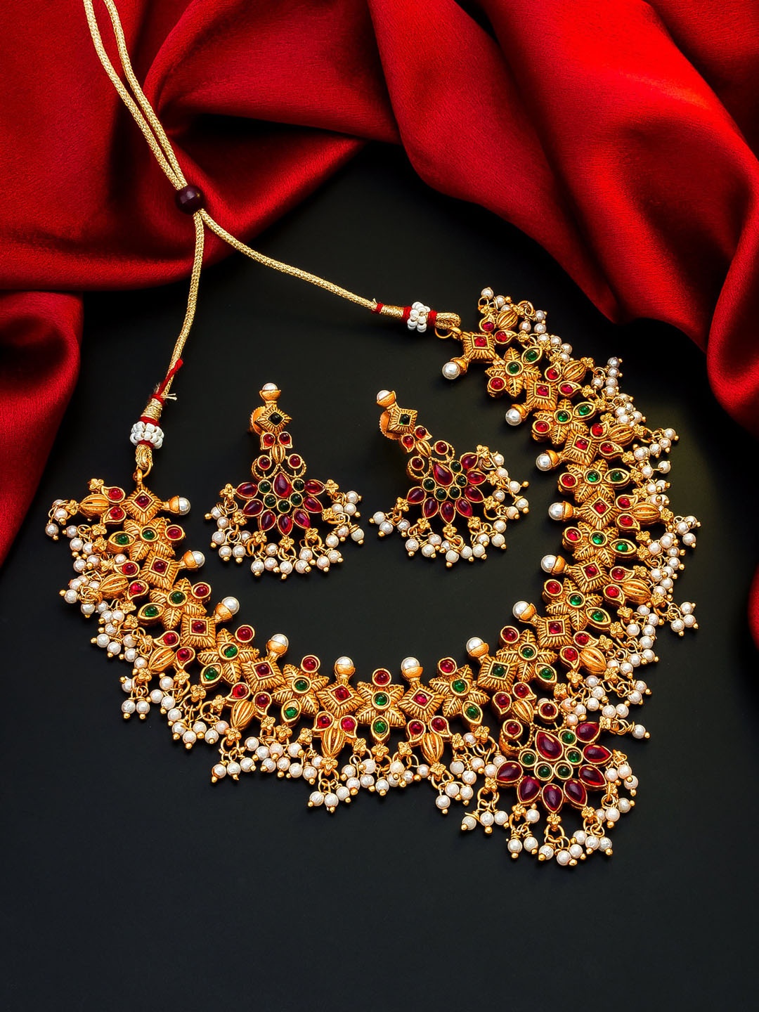 aadita Gold-Plated White & Pink Stone-Studded Beaded Temple Choker Jewellery Set