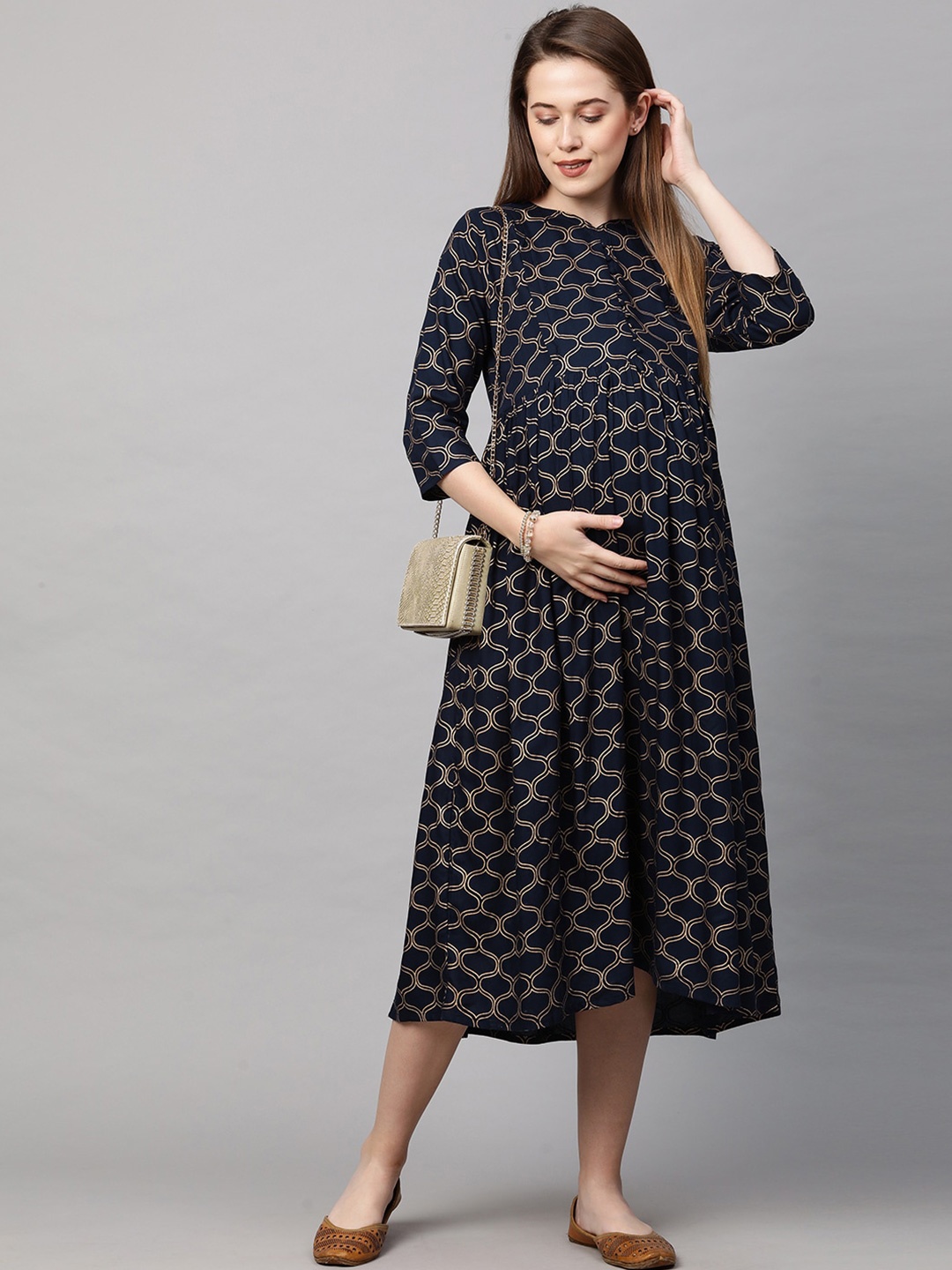 MomToBe Navy Blue & Gold-Toned Geometric Printed Maternity Nursing A-Line Midi Dress
MomToBe Navy Blue & Gold-Toned Geometric Printed Maternity Nursing A-Line Midi Dress