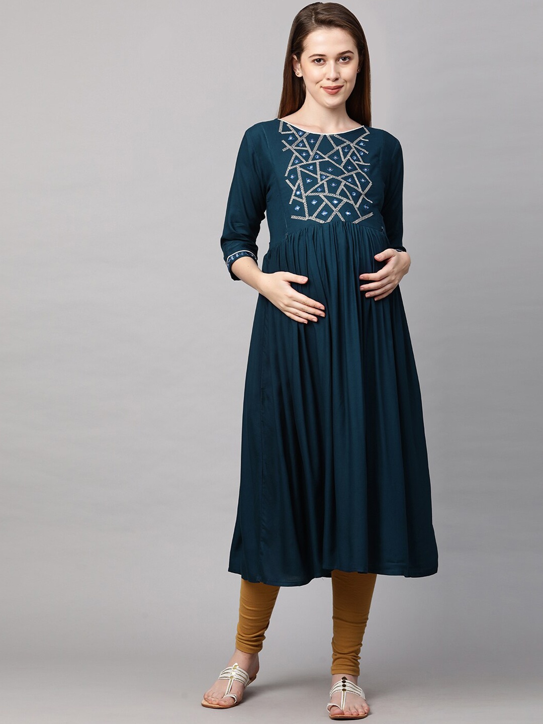 MomToBe Women Teal Maternity Geometric Print Anarkali Sustainable Kurta with Mirror Work Detail
MomToBe Women Teal Maternity Geometric Print Anarkali Sustainable Kurta with Mirror Work Detail