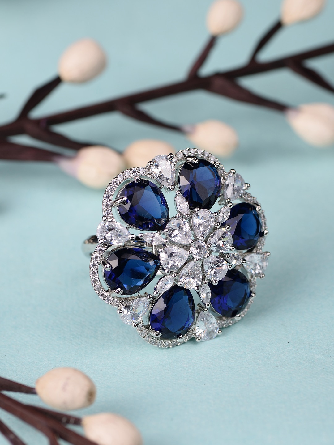 Saraf RS Jewellery Silver-Plated Blue & White AD Studded Adjustable Cocktail Finger Ring
Saraf RS Jewellery Silver-Plated Blue & White AD Studded Adjustable Cocktail Finger Ring