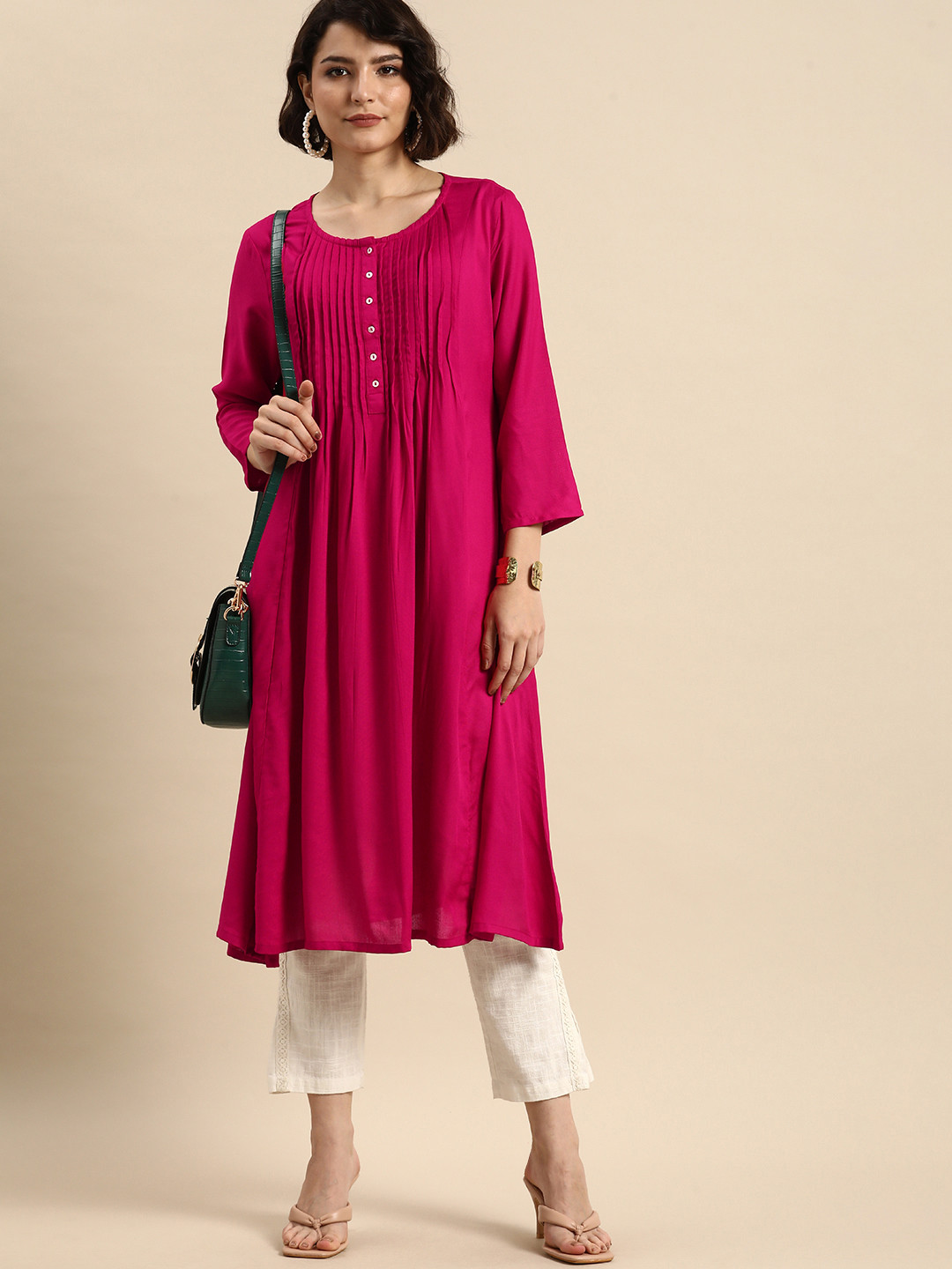 Anouk Women Pink Solid Kurta
Anouk Women Pink Solid Kurta