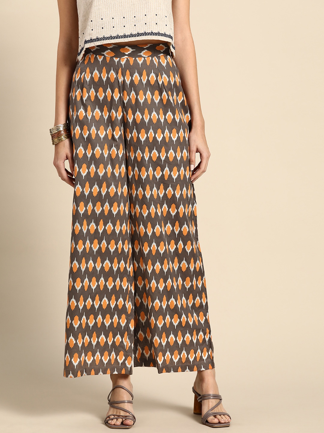 Anouk Women Charcoal Grey & Orange Pure Cotton Ethnic Motifs Printed Wide Leg Palazzos
Anouk Women Charcoal Grey & Orange Pure Cotton Ethnic Motifs Printed Wide Leg Palazzos