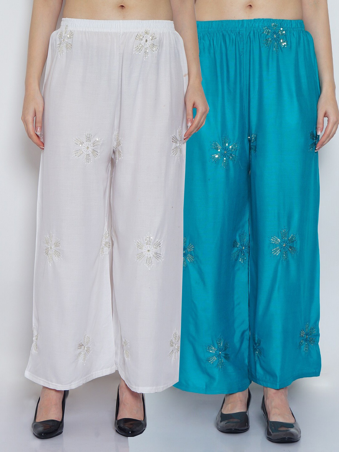 Jinfo Women Pack Of 2 White & Turquoise Blue Floral Embroidered Flared Ethnic Palazzos
Jinfo Women Pack Of 2 White & Turquoise Blue Floral Embroidered Flared Ethnic Palazzos