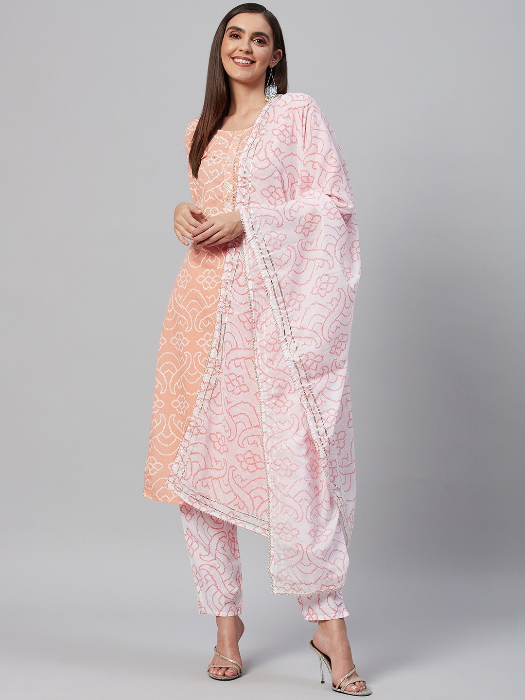 HIGHLIGHT FASHION EXPORT Women Peach-Coloured Printed Cotton Kurta with Trousers & Dupatta
HIGHLIGHT FASHION EXPORT Women Peach-Coloured Printed Cotton Kurta with Trousers & Dupatta