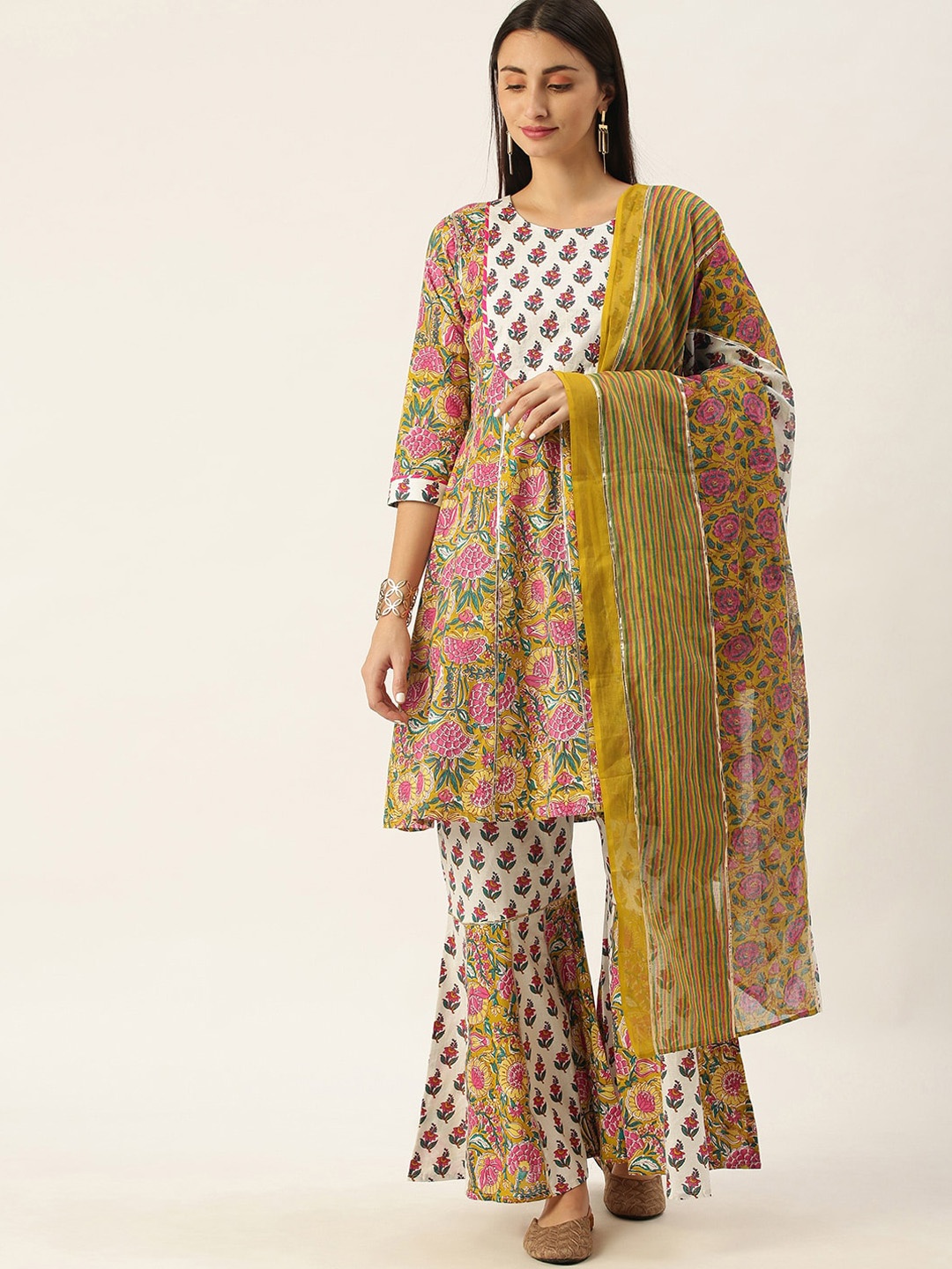 Somras Women Mustard Yellow Floral Printed Empire Liva Kurta with Sharara & With Dupatta
Somras Women Mustard Yellow Floral Printed Empire Liva Kurta with Sharara & With Dupatta