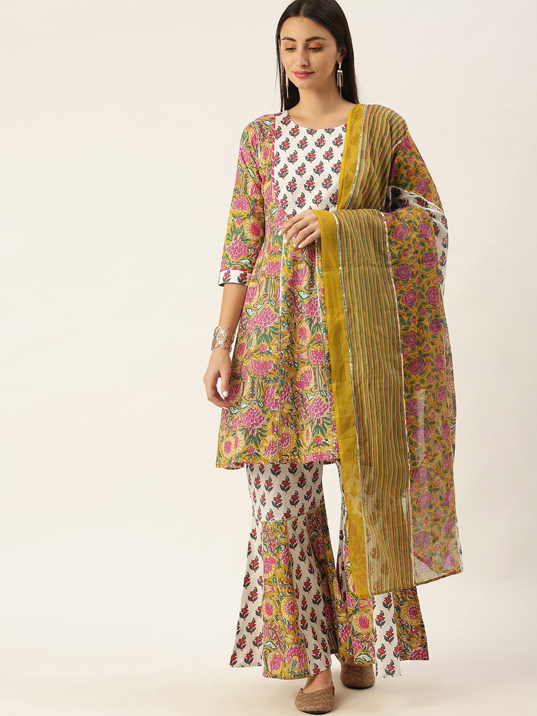 Somras Women Mustard Yellow Floral Printed Empire Liva Top with Sharara & With Dupatta
Somras Women Mustard Yellow Floral Printed Empire Liva Top with Sharara & With Dupatta
