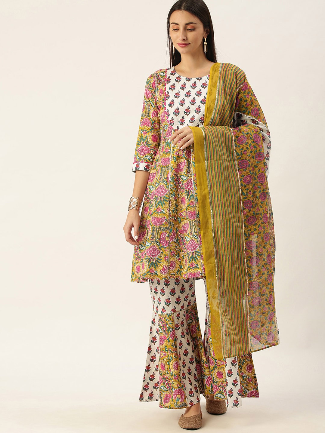 Somras Women Mustard Yellow Floral Printed Empire Liva Kurti with Sharara & With Dupatta
Somras Women Mustard Yellow Floral Printed Empire Liva Kurti with Sharara & With Dupatta