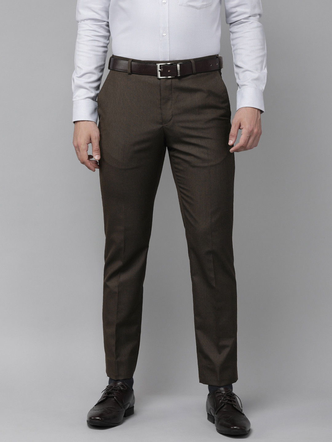Park Avenue Men Brown Solid Mid Rise Formal Trousers
Park Avenue Men Brown Solid Mid Rise Formal Trousers