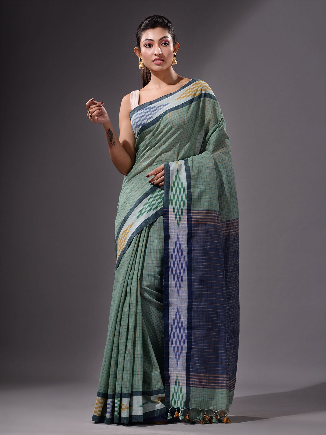 Charukriti Green Woven Design Saree