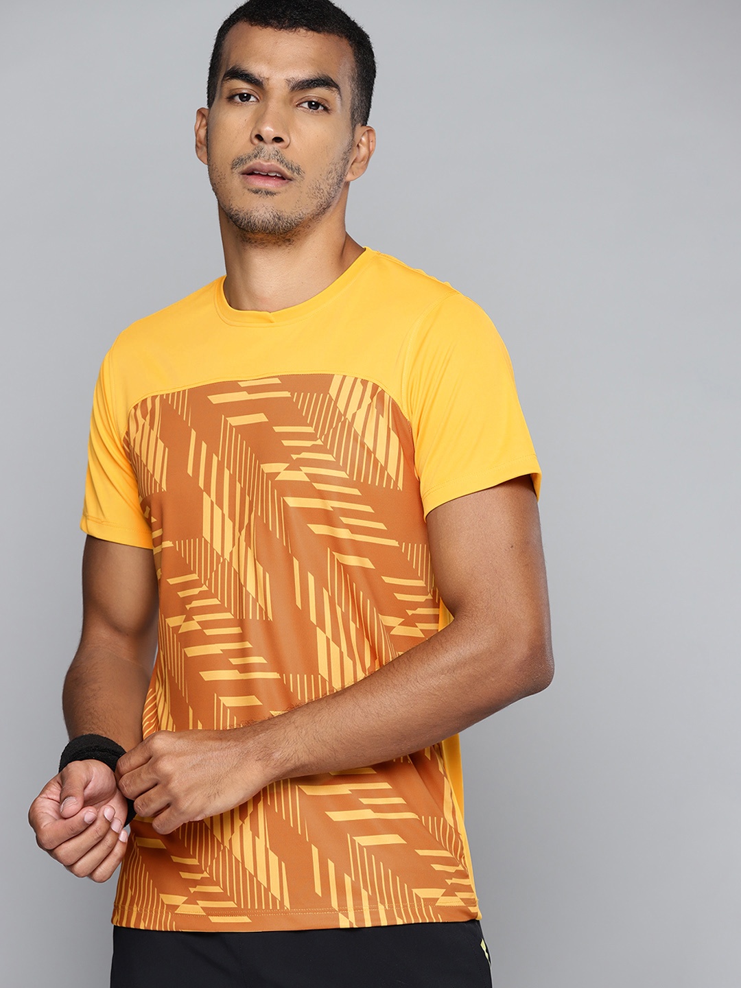HRX By Hrithik Roshan Racketsport Men Gold Fusion Rapid-Dry Geometric Tshirts, Yellow
HRX By Hrithik Roshan Racketsport Men Gold Fusion Rapid-Dry Geometric Tshirts, Yellow
