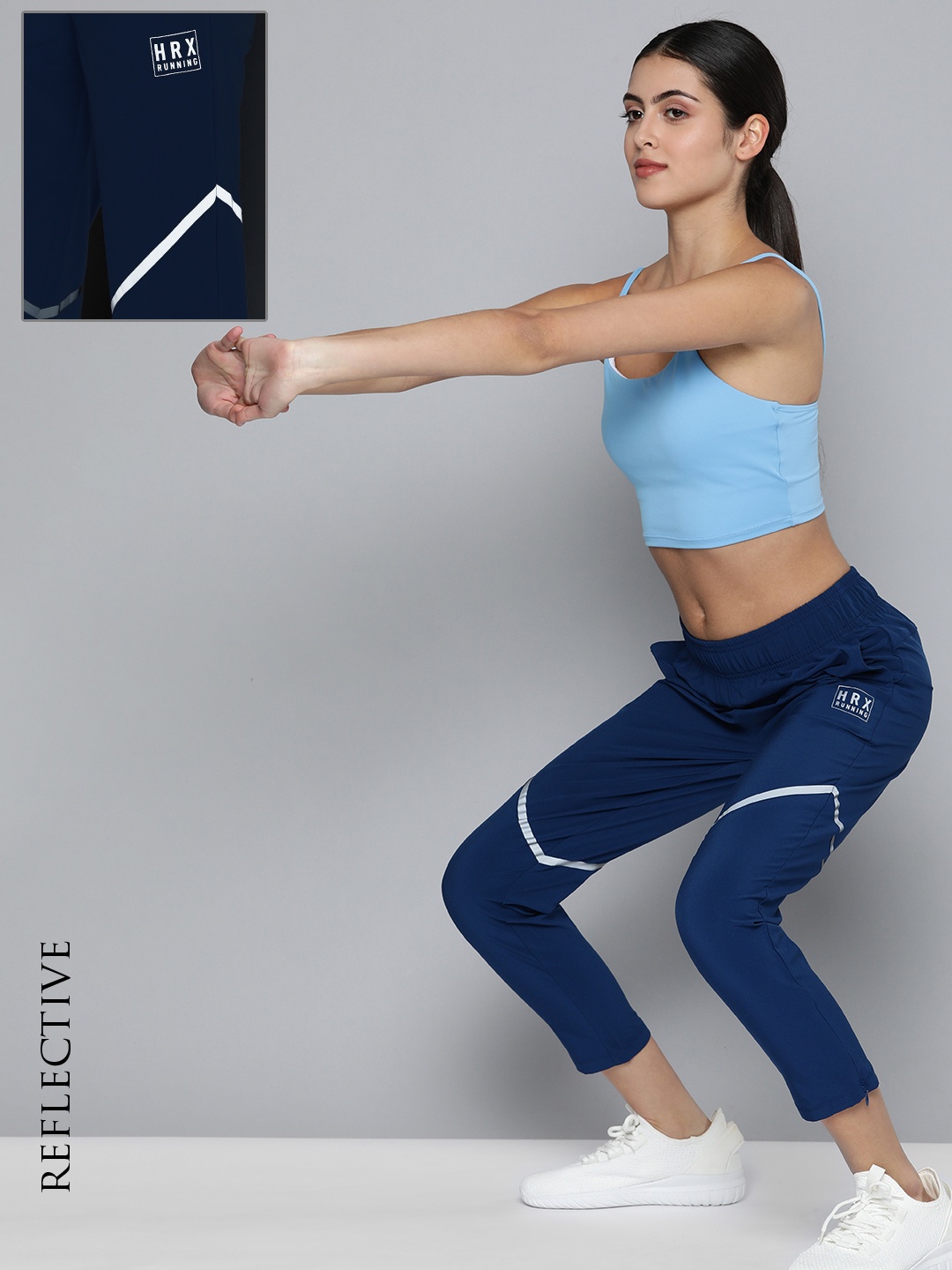 HRX by Hrithik Roshan Women Rapid-Dry Antimicrobial Cropped Running Track Pants, Blue
HRX by Hrithik Roshan Women Rapid-Dry Antimicrobial Cropped Running Track Pants, Blue