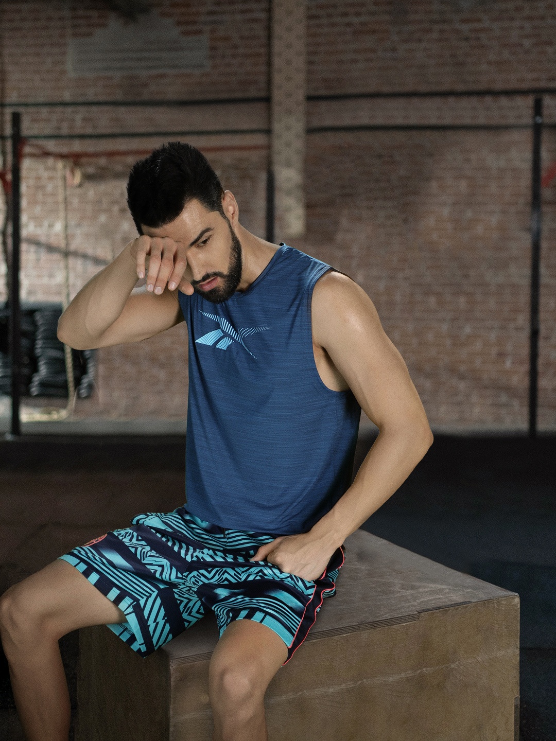 Reebok Men Navy Blue TS AC Sleeveless Brand Logo Printed Activchill Training T-shirt
Reebok Men Navy Blue TS AC Sleeveless Brand Logo Printed Activchill Training T-shirt