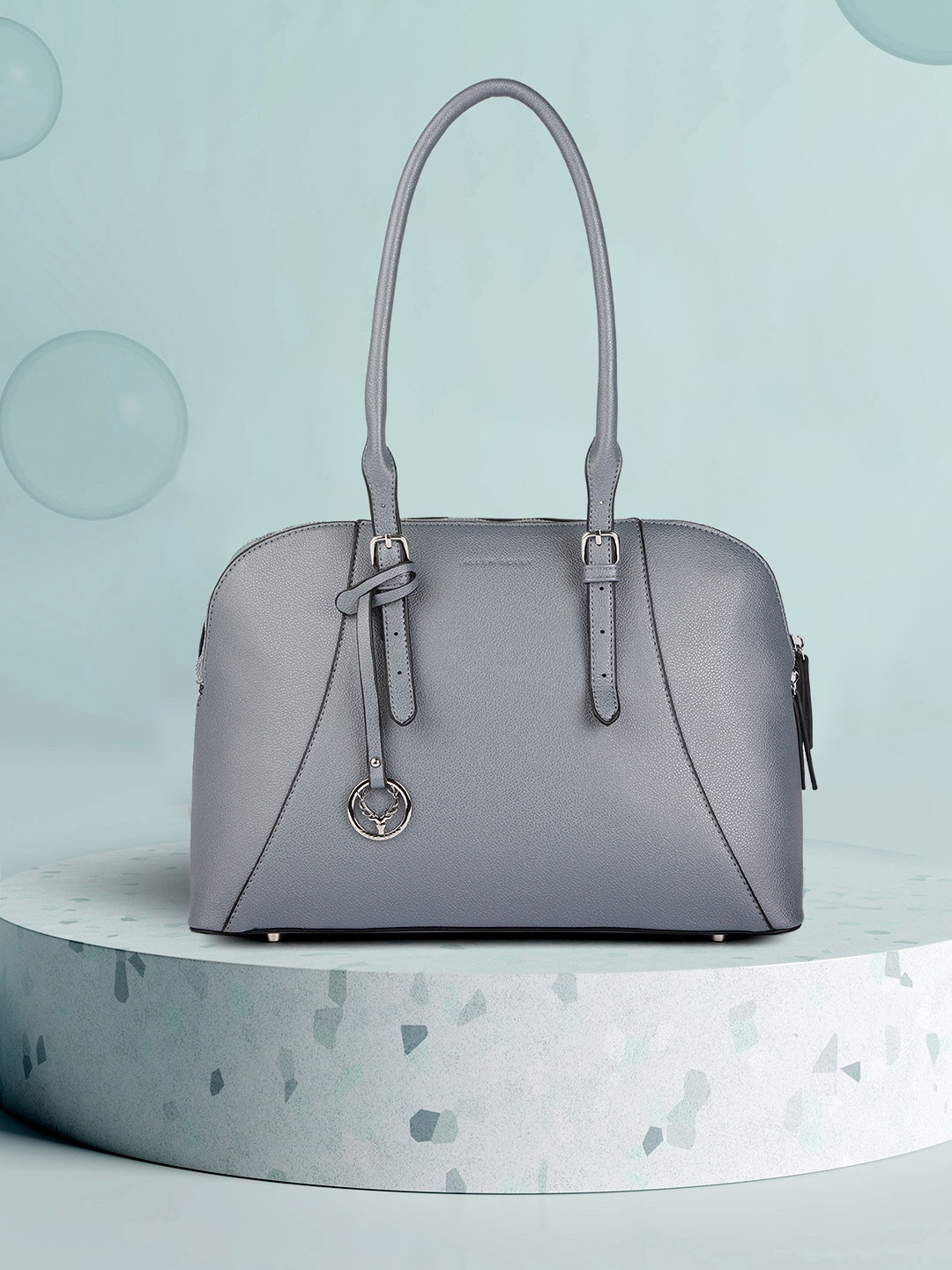 Allen Solly Blue Solid PU Regular Structured Shoulder Bag with Brand Logo Tasselled Detail
Allen Solly Blue Solid PU Regular Structured Shoulder Bag with Brand Logo Tasselled Detail
