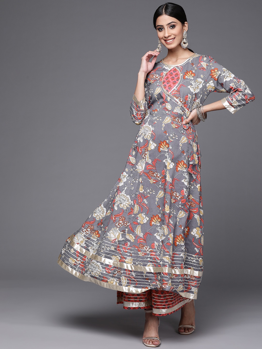 Varanga Women Grey & Pink Floral Print Angrakha Gotta Patti Pure Cotton Kurta with Sharara
Varanga Women Grey & Pink Floral Print Angrakha Gotta Patti Pure Cotton Kurta with Sharara
