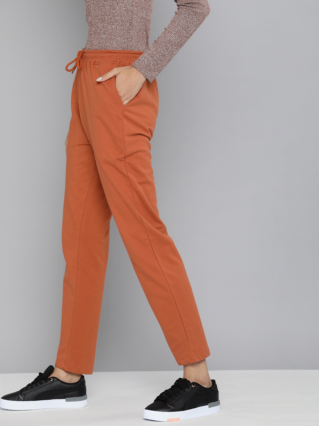 HERE&NOW Women Copper Brown Solid Regular Fit High-Rise Knitted Pure Cotton Track Pants
HERE&NOW Women Copper Brown Solid Regular Fit High-Rise Knitted Pure Cotton Track Pants
