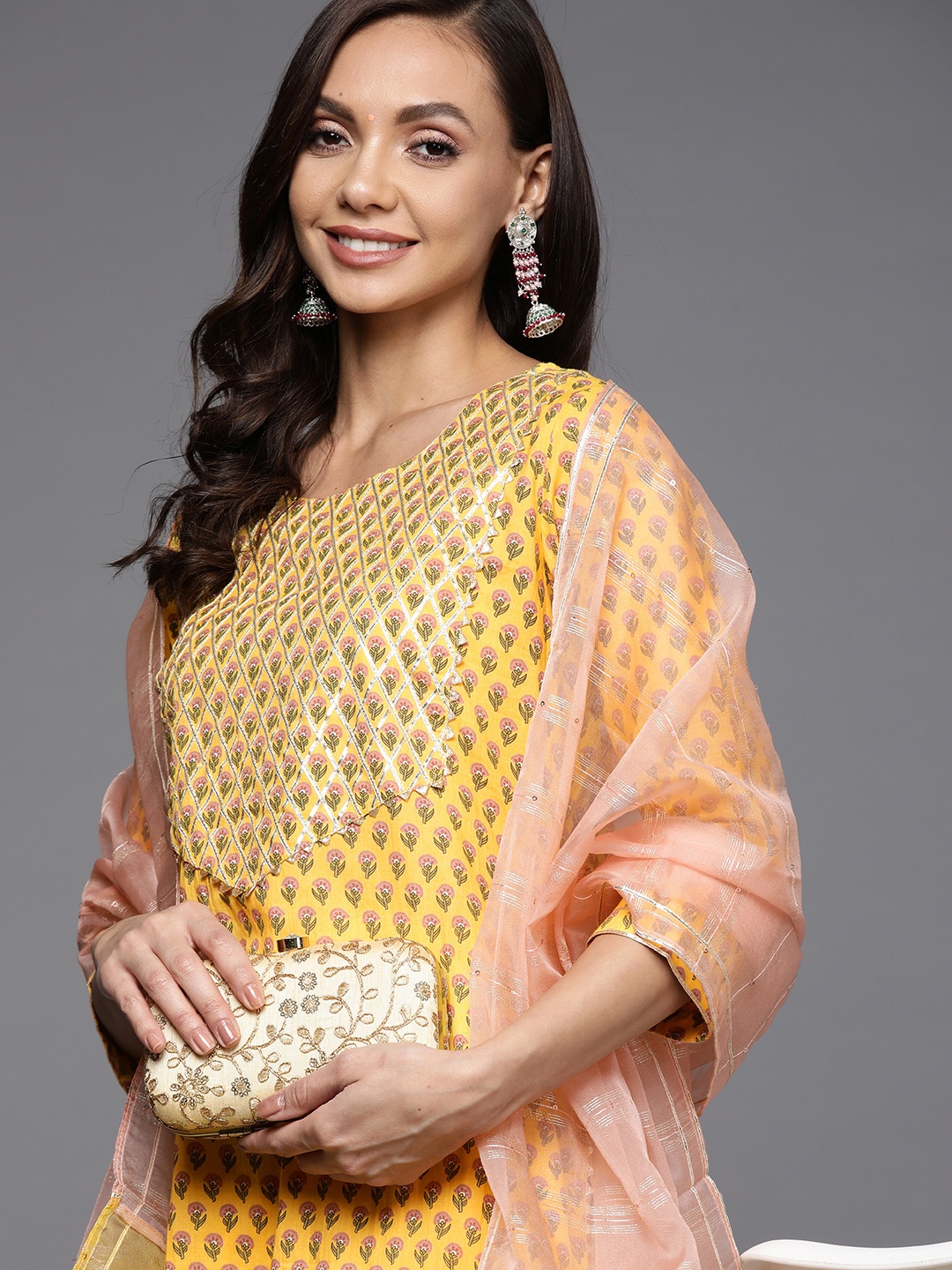 Indo Era Women Yellow Ethnic Motifs Printed Gotta Patti Kurta with Palazzos & With Dupatta
Indo Era Women Yellow Ethnic Motifs Printed Gotta Patti Kurta with Palazzos & With Dupatta