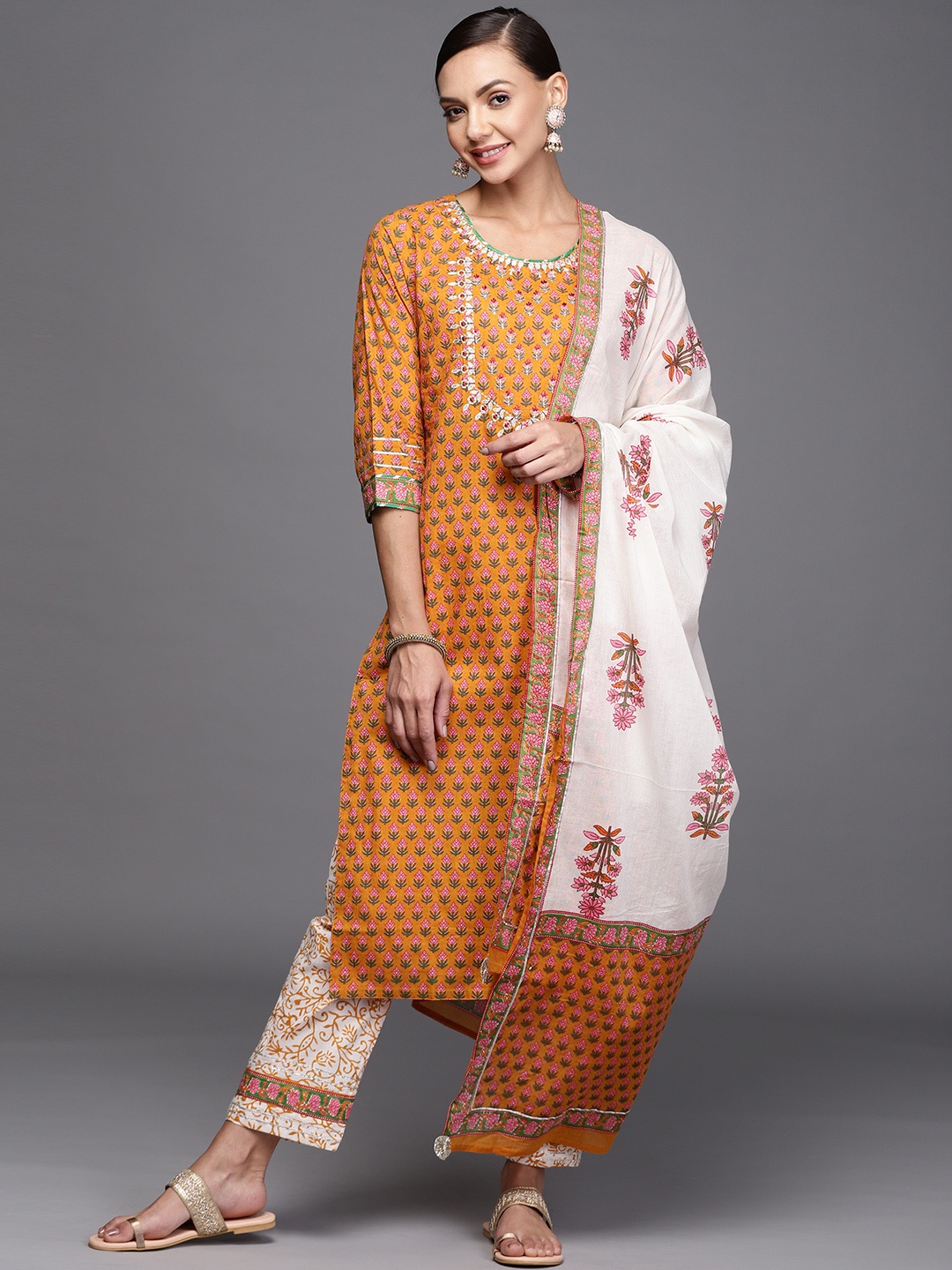 Indo Era Women Mustard Yellow & Off-White Ethnic Print Kurta with Trousers & Dupatta
Indo Era Women Mustard Yellow & Off-White Ethnic Print Kurta with Trousers & Dupatta