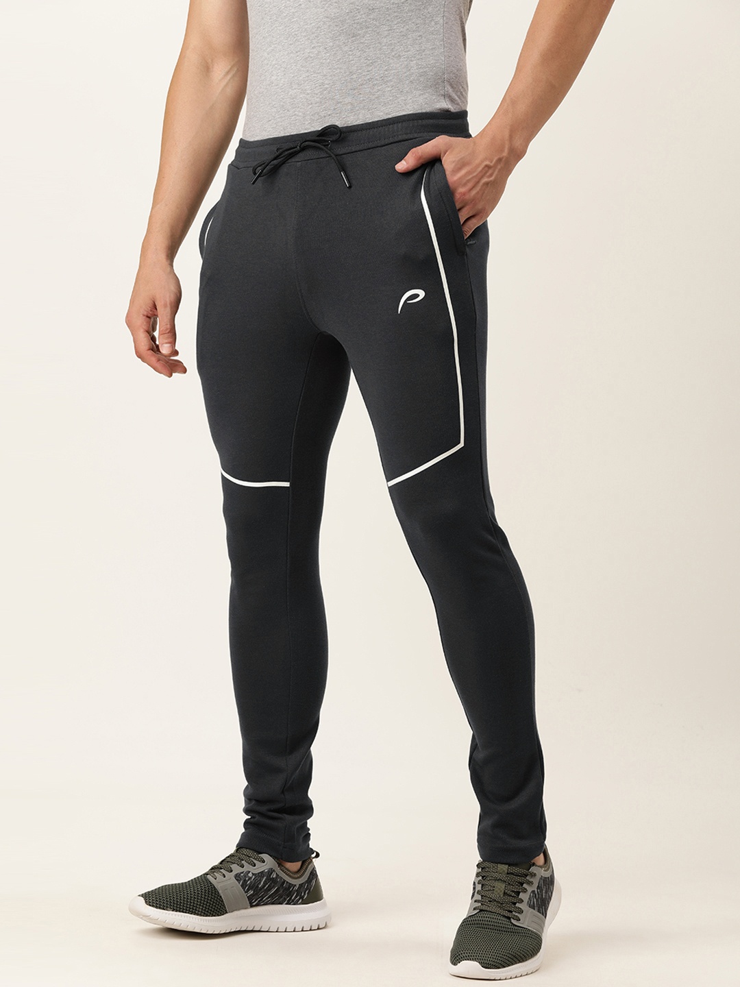 Proline Active Men Grey & White Colourblocked Mid Rise Elasticated Casual Track Pants
Proline Active Men Grey & White Colourblocked Mid Rise Elasticated Casual Track Pants