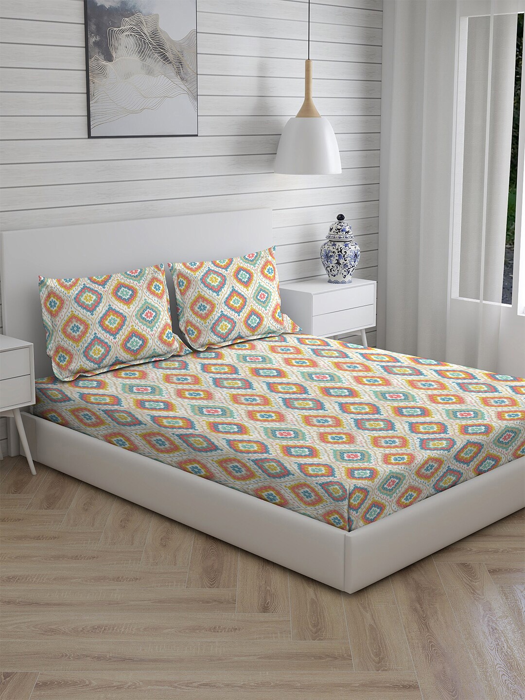 Layers Off White & Orange Ethnic Motifs Cotton 104 TC King Bedsheet with 2 Pillow Covers
Layers Off White & Orange Ethnic Motifs Cotton 104 TC King Bedsheet with 2 Pillow Covers