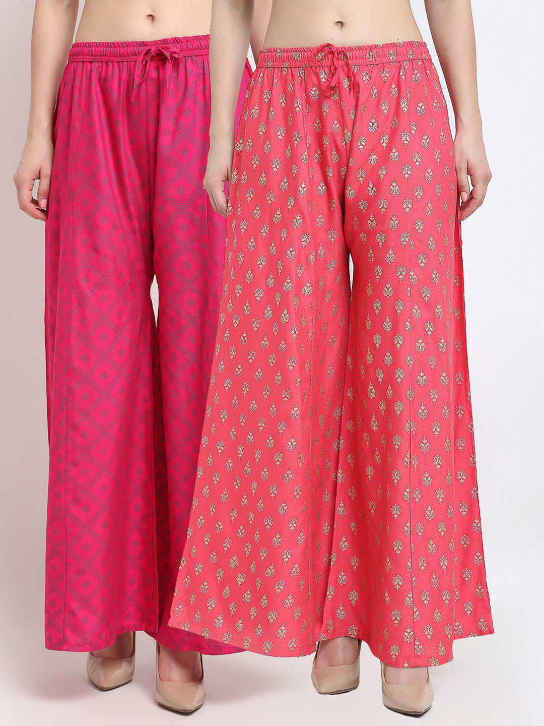 Jinfo Women Pack of 2 Pink & Peach-Coloured Ethnic Motifs Printed Flared Ethnic Palazzos
Jinfo Women Pack of 2 Pink & Peach-Coloured Ethnic Motifs Printed Flared Ethnic Palazzos