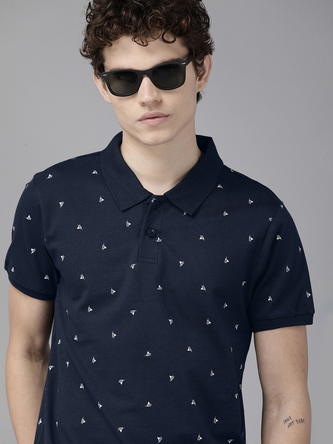 The Roadster Lifestyle Co. Men Navy Blue & White Printed Polo Collar Pure Cotton T-shirt
The Roadster Lifestyle Co. Men Navy Blue & White Printed Polo Collar Pure Cotton T-shirt