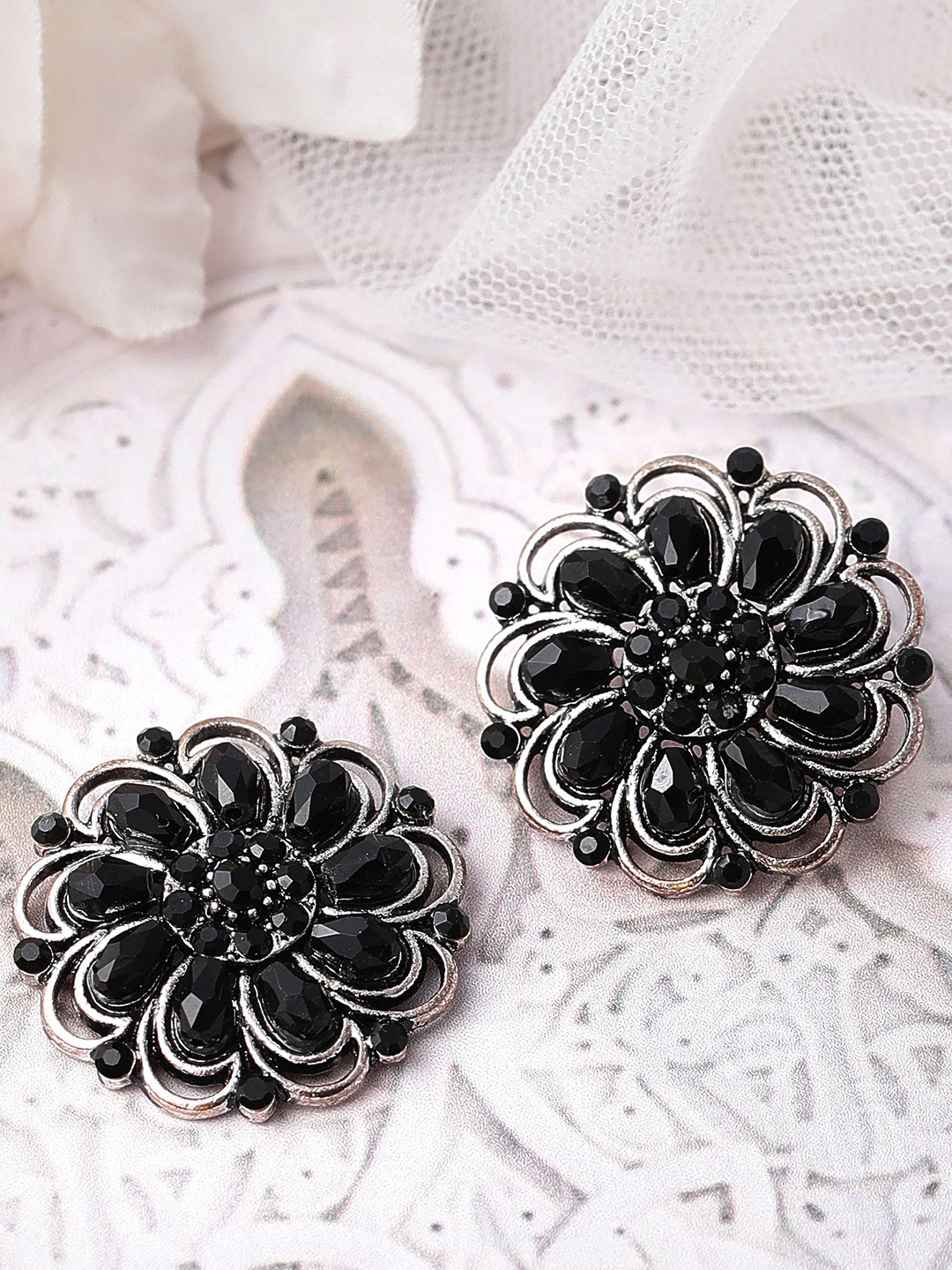 Rubans Silver-Toned & Black Floral Studs Earrings
Rubans Silver-Toned & Black Floral Studs Earrings