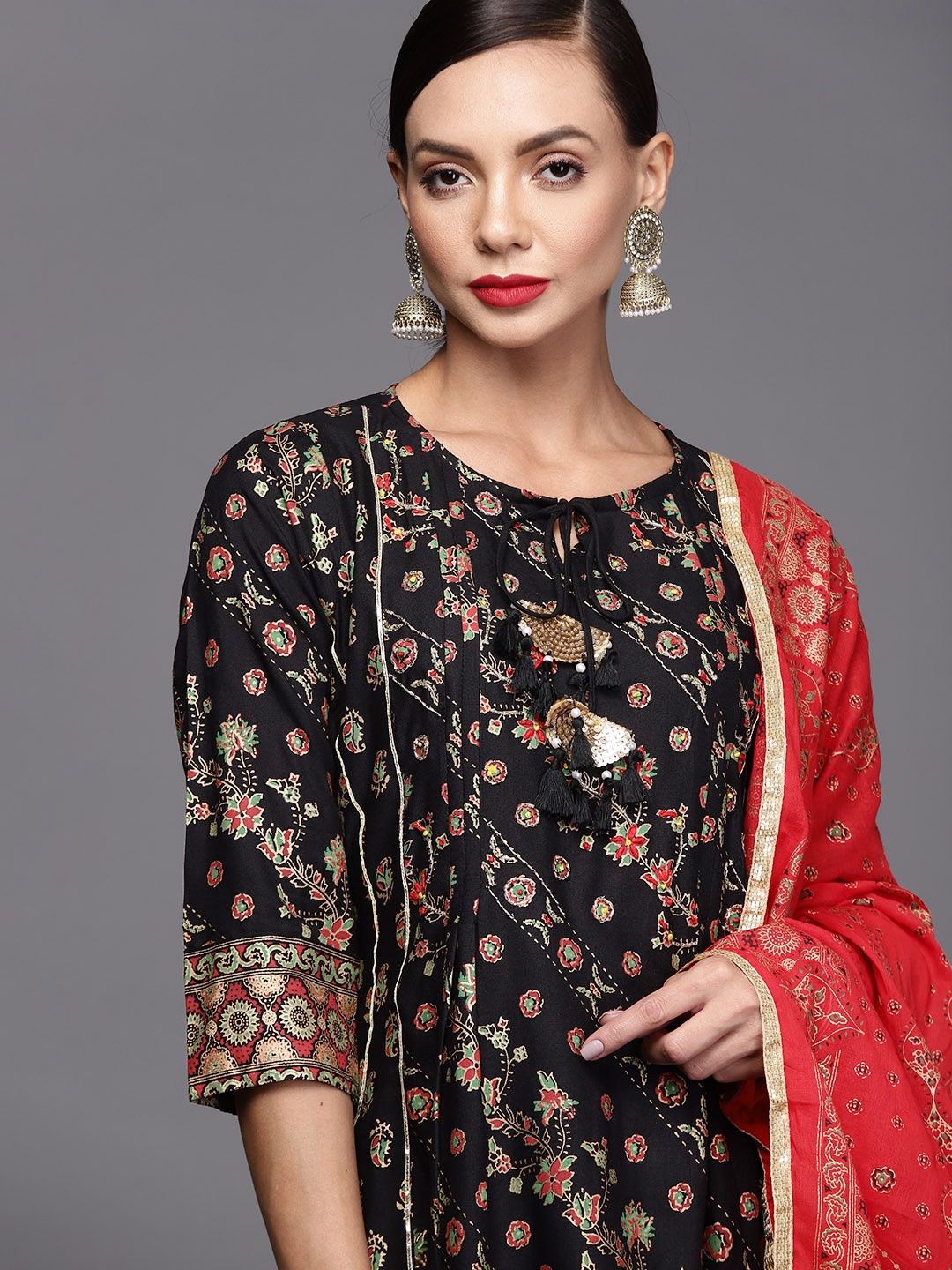 Indo Era Women Black & Golden Ethnic Motifs Printed Panelled Kurta with Trousers & Dupatta
Indo Era Women Black & Golden Ethnic Motifs Printed Panelled Kurta with Trousers & Dupatta
