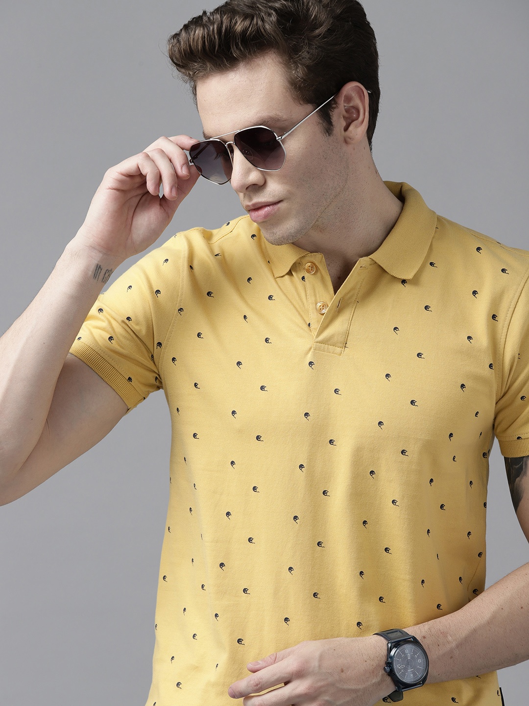 Roadster Men Mustard Yellow & Black Conversational Printed Polo Collar Pure Cotton T-shirt
Roadster Men Mustard Yellow & Black Conversational Printed Polo Collar Pure Cotton T-shirt