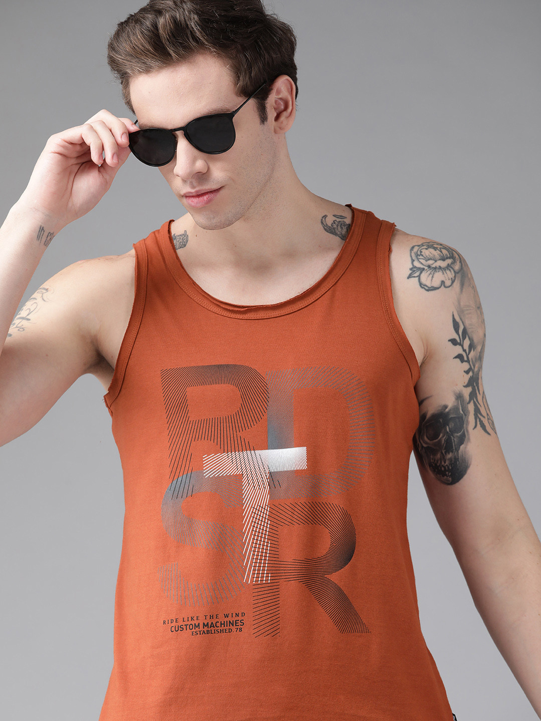 Roadster Men Rust Orange & Black Brand Logo Printed Pure Cotton T-shirt 
Roadster Men Rust Orange & Black Brand Logo Printed Pure Cotton T-shirt