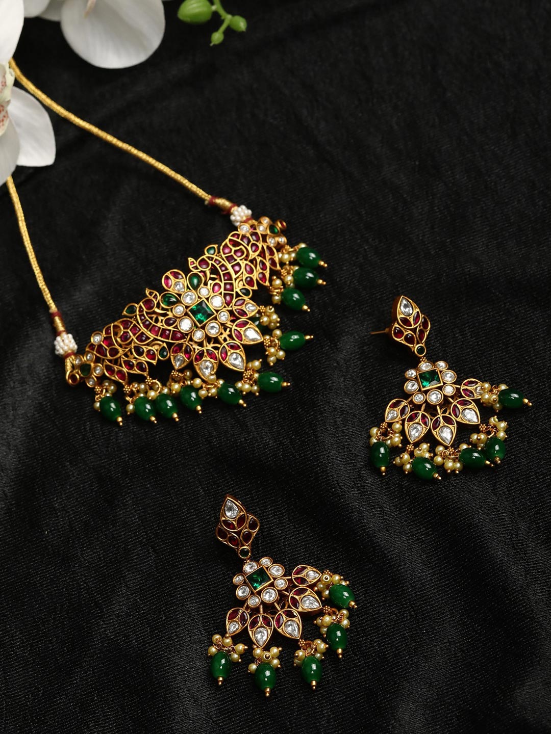 Priyaasi Women Gold-Plated Green & Red Pearls Beaded Ruby Stone Studded Jewellery Set
Priyaasi Women Gold-Plated Green & Red Pearls Beaded Ruby Stone Studded Jewellery Set