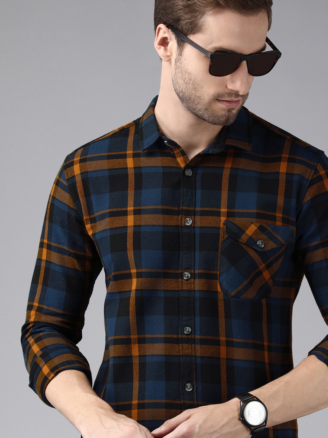 Voi Jeans Men Navy Blue & Mustard Yellow Standard Slim Fit Checked Cotton Casual Shirt
Voi Jeans Men Navy Blue & Mustard Yellow Standard Slim Fit Checked Cotton Casual Shirt