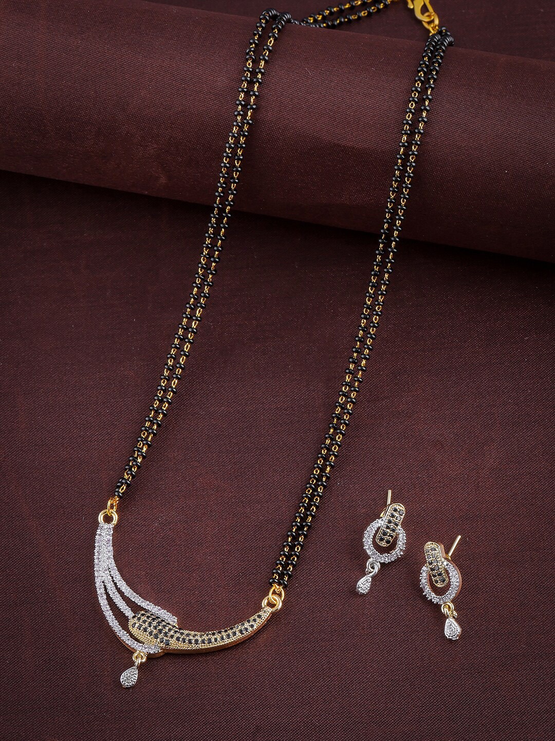Brandsoon Gold-Plated White & Black Stone AD Studded Mangalsutra With Earrings, Multi
Brandsoon Gold-Plated White & Black Stone AD Studded Mangalsutra With Earrings, Multi