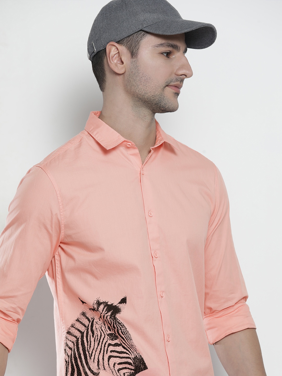 The Indian Garage Co Men Peach-Coloured Graphic Placement Printed Cotton Casual Shirt
The Indian Garage Co Men Peach-Coloured Graphic Placement Printed Cotton Casual Shirt