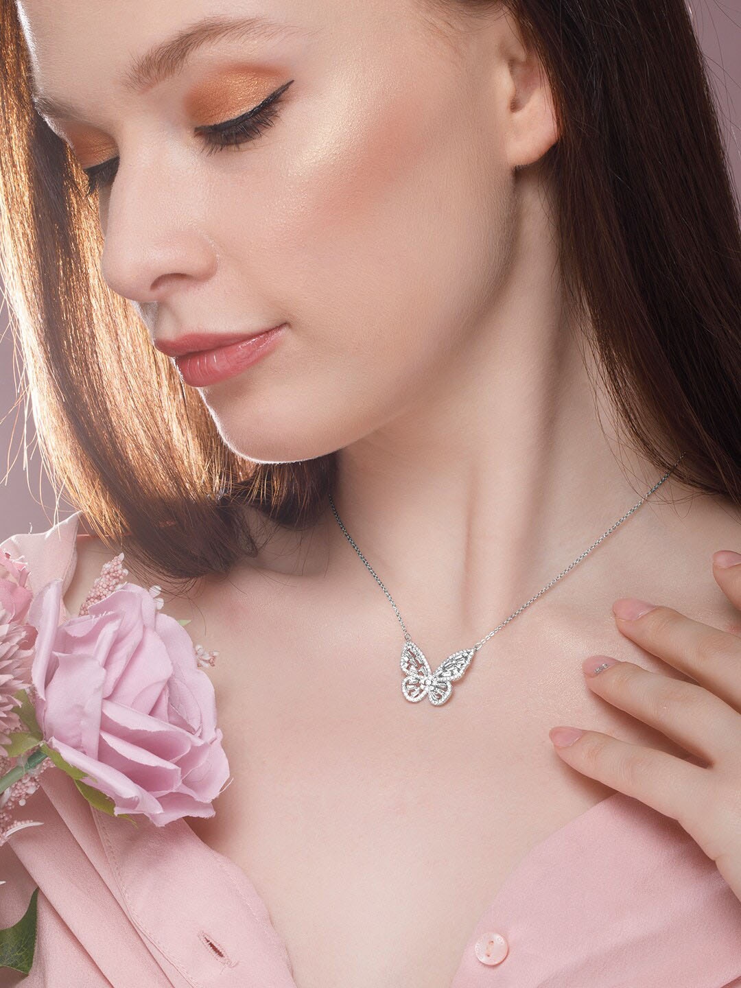 Rubans Voguish Silver-Toned & White AD Studded Butterfly Pendant 22K Silver-Plated Chain
Rubans Voguish Silver-Toned & White AD Studded Butterfly Pendant 22K Silver-Plated Chain