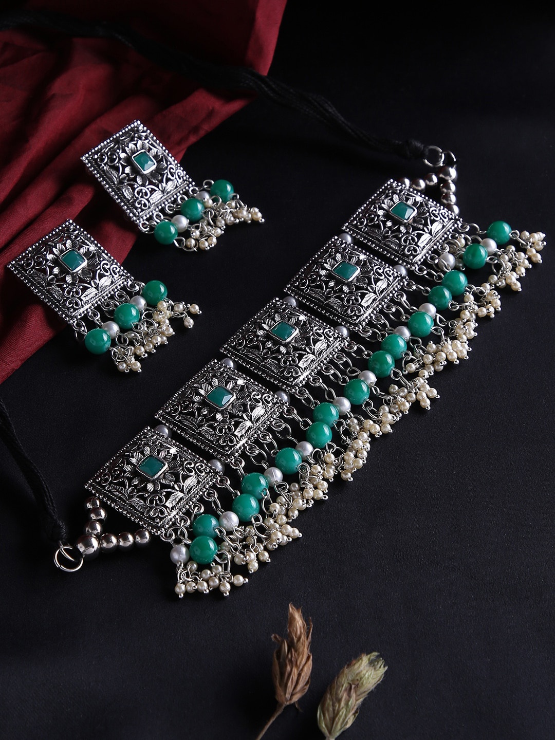 justpeachy Oxidised Silver-Plated White & Green Stone-Studded & Pearl Beaded Jewellery Set
justpeachy Oxidised Silver-Plated White & Green Stone-Studded & Pearl Beaded Jewellery Set