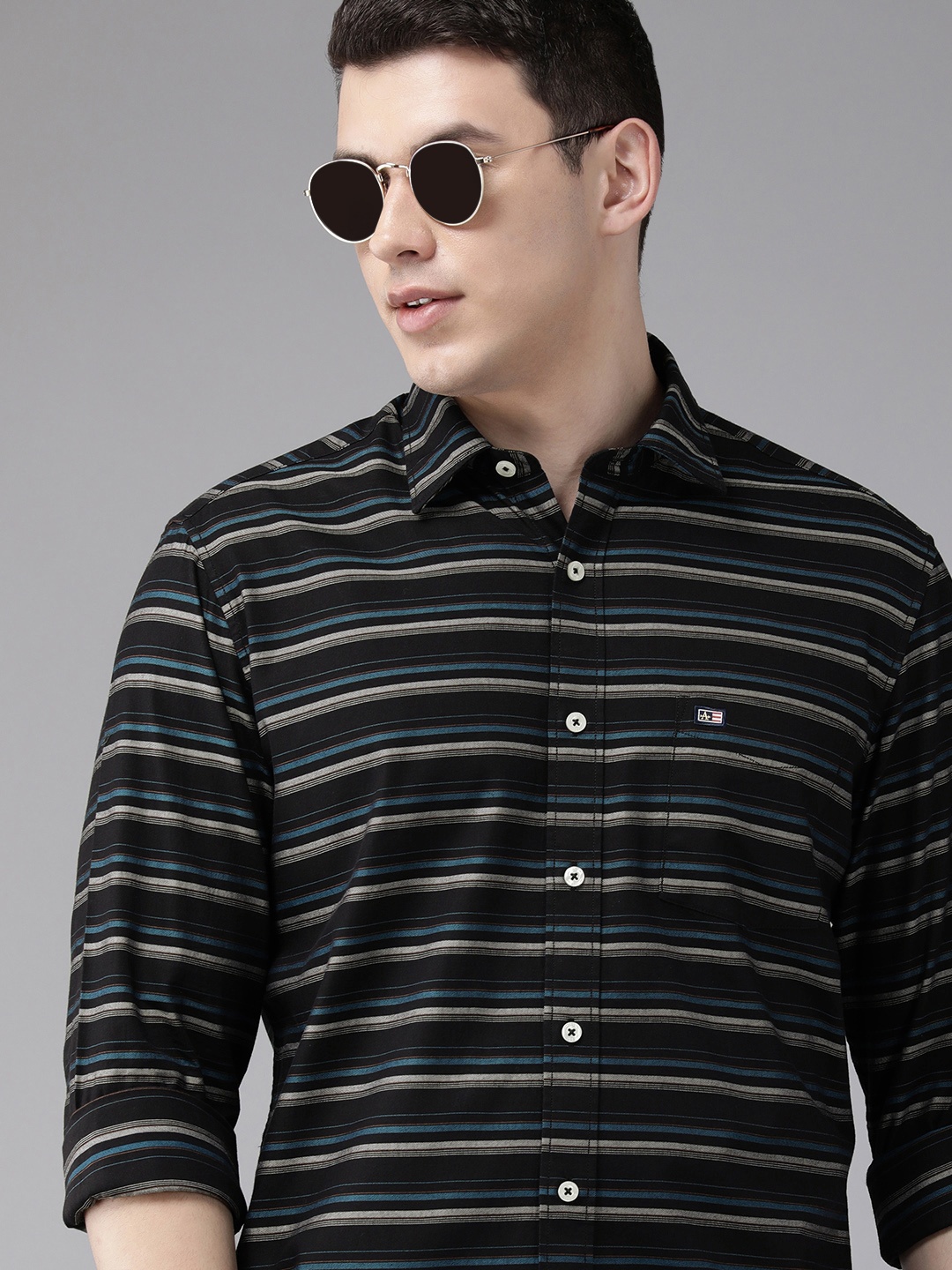 Arrow Men Navy Blue Original Horizontal Stripes Slim Fit Pure Cotton Casual Shirt
Arrow Men Navy Blue Original Horizontal Stripes Slim Fit Pure Cotton Casual Shirt