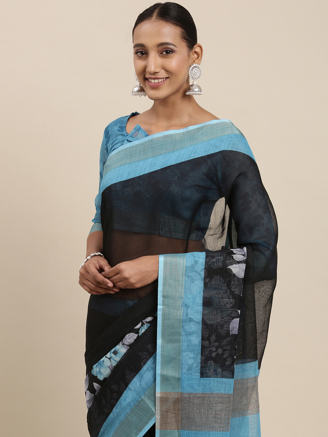Rudra Fashion Black & Blue Floral Printed Ikat Saree
Rudra Fashion Black & Blue Floral Printed Ikat Saree