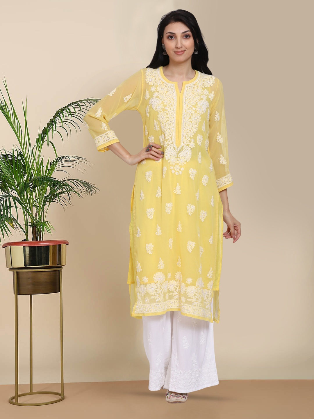 PARAMOUNT CHIKAN Women Yellow Ethnic Motifs Hand Embroidered Chikankari Georgette Kurta
PARAMOUNT CHIKAN Women Yellow Ethnic Motifs Hand Embroidered Chikankari Georgette Kurta