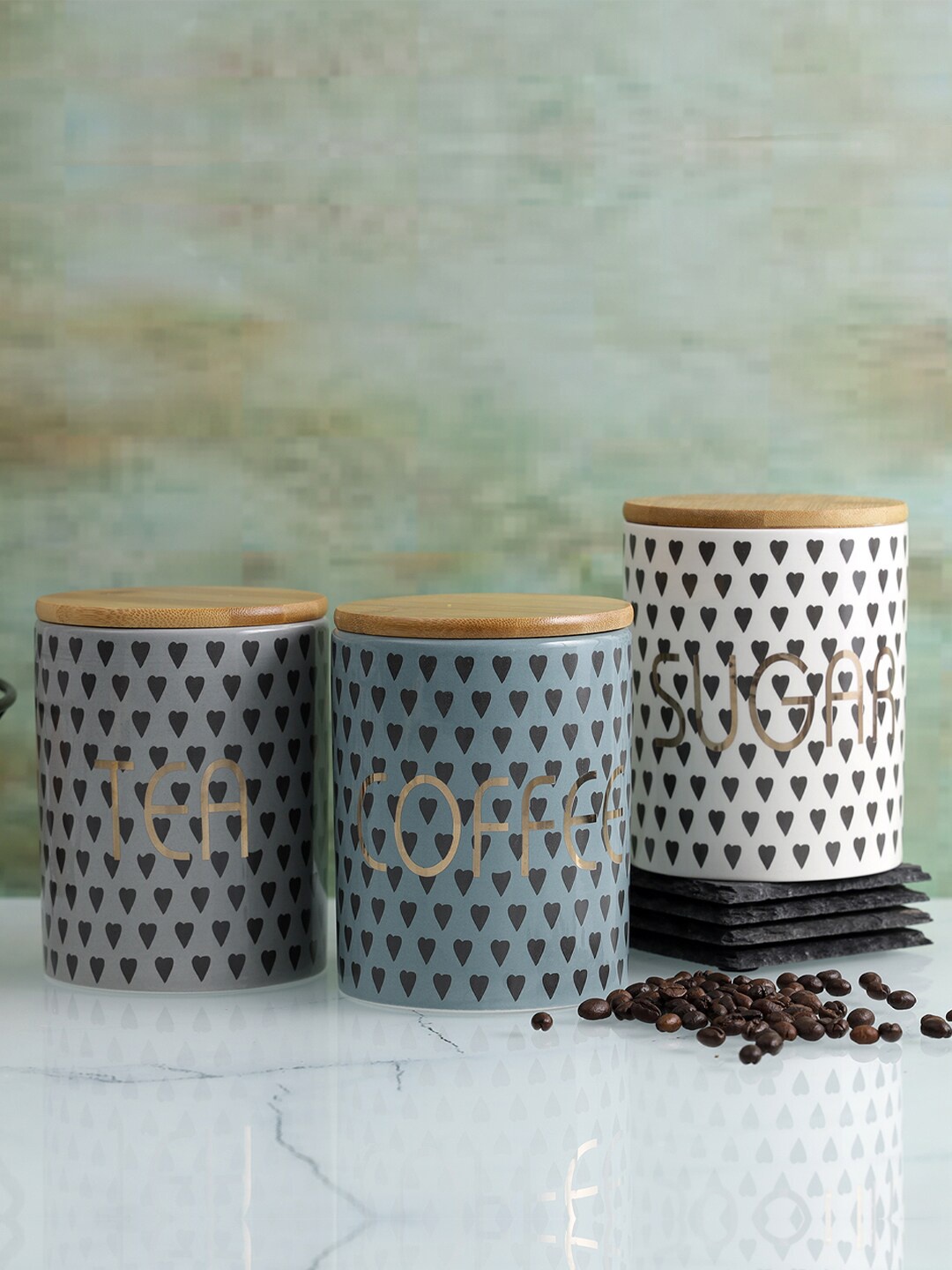 A Vintage Affair- Home Decor Set of 3 Grey & Blue Printed Kitchen Storage Canisters
A Vintage Affair- Home Decor Set of 3 Grey & Blue Printed Kitchen Storage Canisters