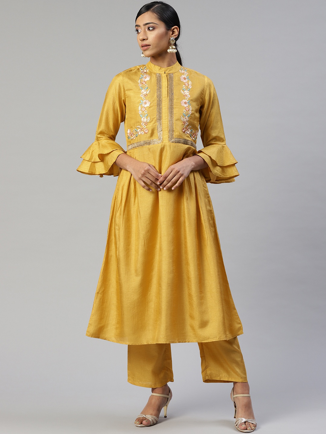 Cottinfab Women Mustard Yellow Ethnic Motifs Embroidered Pleated Kurta with Palazzos
Cottinfab Women Mustard Yellow Ethnic Motifs Embroidered Pleated Kurta with Palazzos